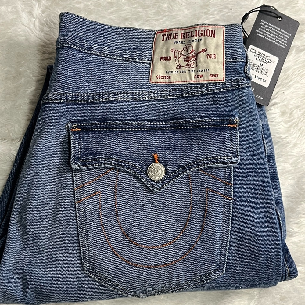 TRUE RELIGION Ricky Relaxed straight big T flap Medium Fresh
Wash Jeans Size 34